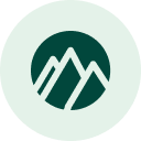 Logo for Emerald City Orthodontics in Kirkland, WA: dark green mountain silhouette within a green circle on a pale green background.