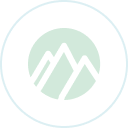 Two stylized mountain peaks inside a light green circle, representing Emerald City Orthodontics in Kirkland, WA on white.