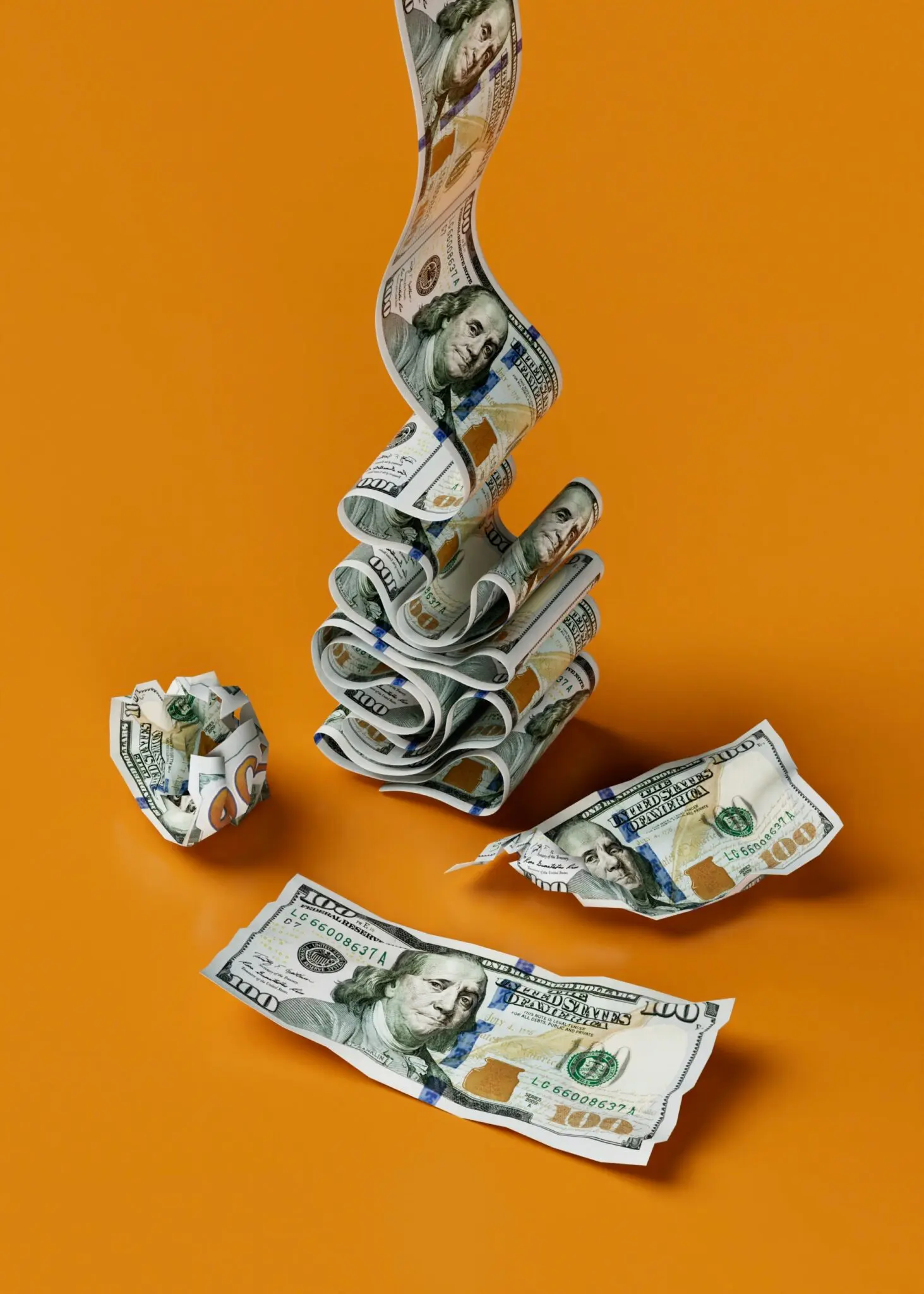 Hundred dollar bills arranged on orange, showing cost factors for Emerald City Orthodontics’ insurance plans in Kirkland, WA.
