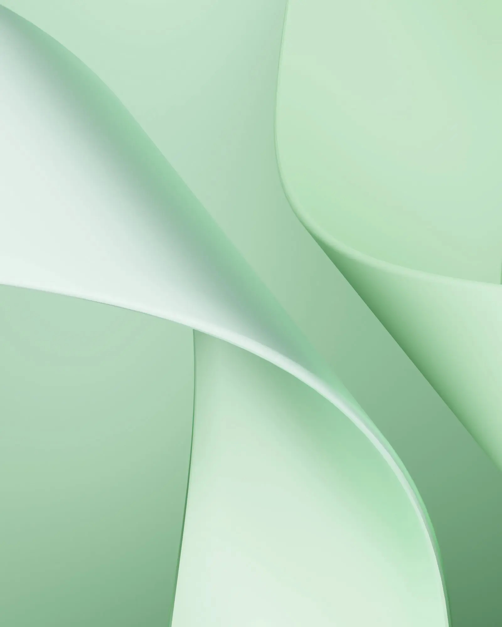 Soft, layered green shapes evoke Emerald City Orthodontics' elegant technology in Kirkland, WA, with smooth, flowing curves.