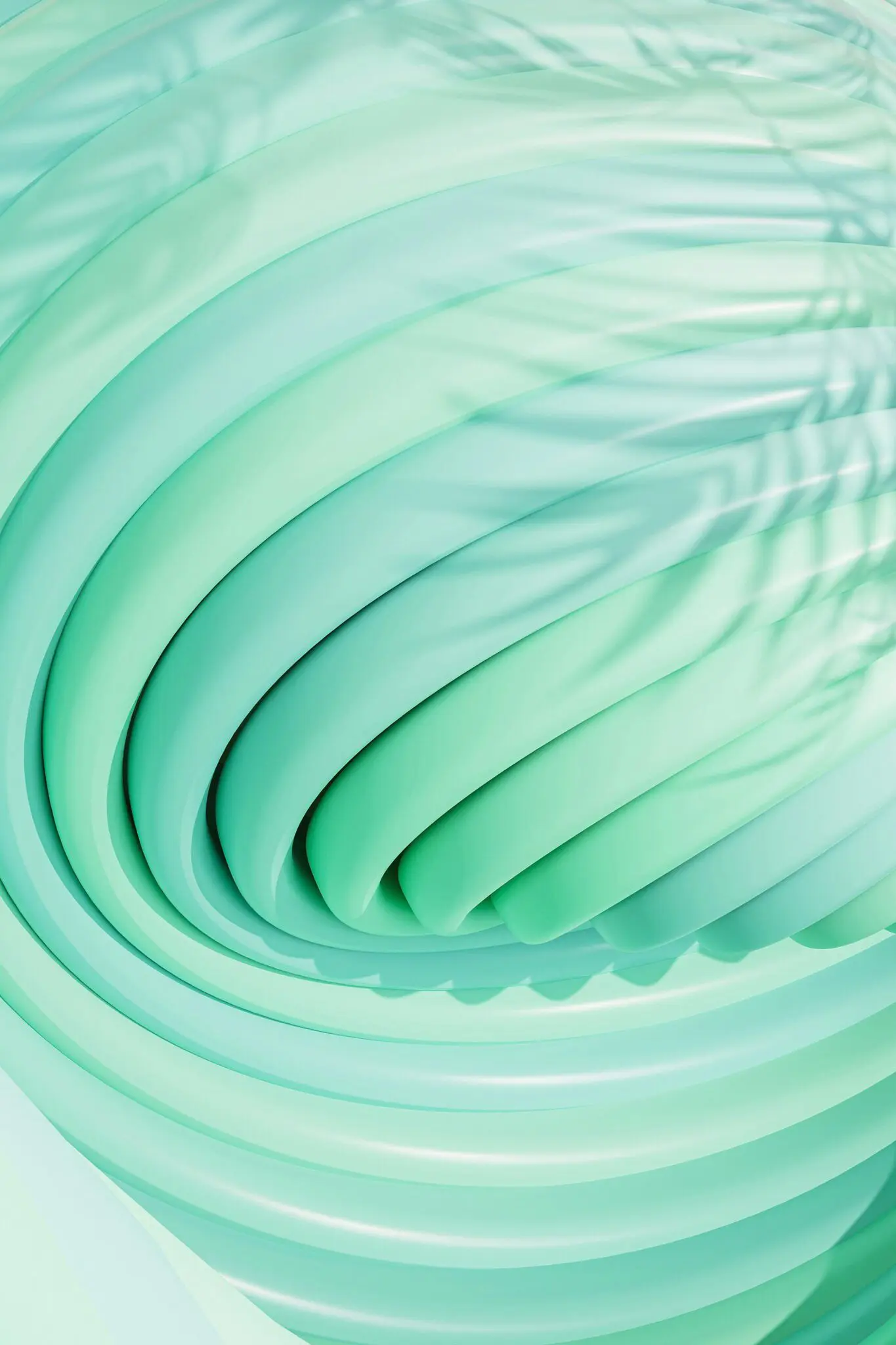 Mint-green, curved shapes layer in a swirling pattern with soft shadows, representing Emerald City Orthodontics in Kirkland, WA.